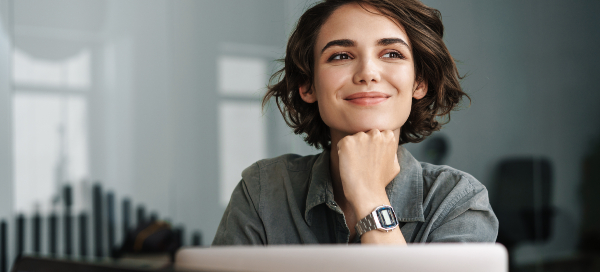 Cheerful woman working in an office